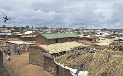  ?? Photos: Fanni Uusitalo & Amos Gumulira ?? Crowded in: The Dzaleka refugee camp was built in 1994 to house 10 000 people and already it is home to about 52 000.