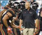  ?? ANDRES LEIVA / THE PALM BEACH POST ?? Hurricanes coach Mark Richt put together a top-10 recruiting class the likes of which Miami has not seen in a decade.