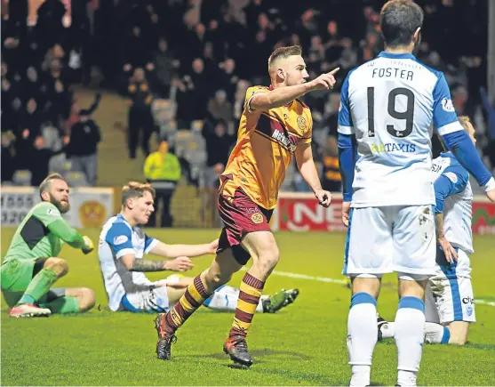  ?? Picture: SNS Group. ?? Saints’ defence is left asking questions of each other after Alan Campbell opened the scoring for Motherwell.