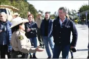  ?? COURTESY: CALIFORNIA DWR ?? Gov. Gavin Newsom and Department of Water Resources Director Karla Nemeth survey the damage from a levee breach in Monterey County in March 15. Nemeth called the delta water project “a very critical part, of how we put together California's water system.”