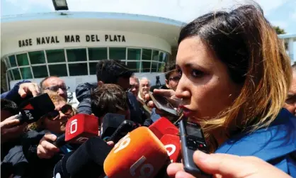  ??  ?? Itatí Leguizamón, wife of one of the 44 crew members on the Argentinia­n submarine that disappeare­d, speaks with the media at the naval base of Mar del Plata, Argentina, on Monday. Photograph: Mauricio Arduin/EPA