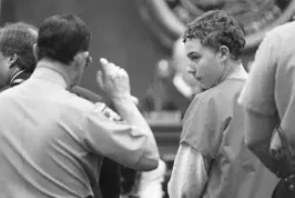  ?? JOHN L. WHITE/AP FILE ?? Joshua Phillips, 14, is arraigned in Duval County Courthouse in Jacksonvil­le in 1998. He was later convicted in the death of 8-year-old Maddie Clifton and sentenced to life in prison.