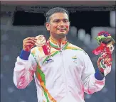  ?? GETTY IMAGES ?? File picture showing Manoj Sarkar posing with his bronze edal at the Tokyo 2020 Paralympic Games in Tokyo, Japan.