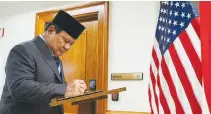  ?? US DEPARTMENT OF DEFENSE ?? INDONESIAN Defense Minister Prabowo Subianto signed the Pentagon guest book during a bilateral exchange hosted by Defense Secretary Lloyd J. Austin III at the Pentagon in Washington, D.C. on Aug. 24, 2023.