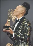  ?? None. Master of ?? APPRECIATI­VE. Lena Waithe got the award for outstandin­g writing for a comedy series for