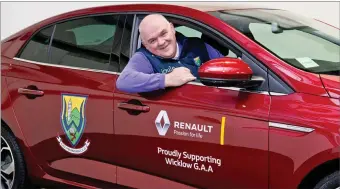 ??  ?? Wicklow Senior County Football Manager John Evans behind the wheel of his new car.
