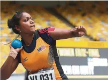  ??  ?? Hemala Devi proved her might with her golden throws. — IZZRAFIQ ALIAS/ The Star