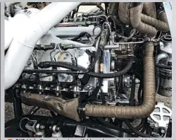  ??  ?? DHD high-flow exhaust manifolds and up-pipes help drive the front-mounted Precision charger, with double stitch titanium manifold blankets and heat wrap aiding efficiency. Also notice the Wagler cast street intake in the valley, which with its V-band connection point ensures there are never any issues forcing 80-psi worth of boost into the heads. Gear-driven off the billet front cover are two stroker CP3’S from Exergy Performanc­e. The 14mm pumps deliver fuel to Exergybuil­t and balanced injectors fitted with 400-percent over nozzles.