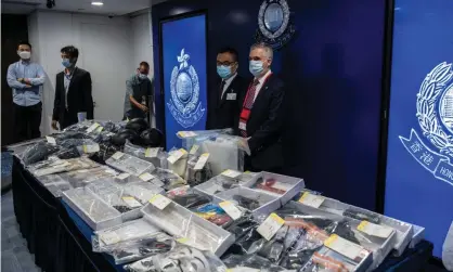  ?? Photograph: Vernon Yuen/Rex/Shuttersto­ck ?? Police present evidence at a press conference in Hong Kong on Tuesday after the arrest of nine people over an alleged bomb plot.