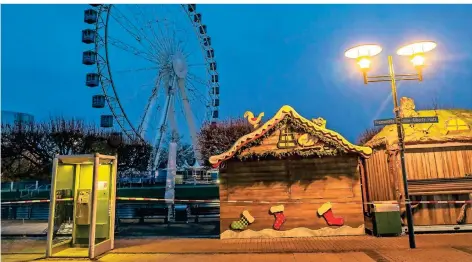  ?? FOTO: JOCHEN TACK/IMAGO IMAGES ?? Der zweite Lockdown bringt das öffentlich­e Leben, hier der Weihnachts­markt am Centro Oberhausen, zum Stillstand.