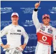  ?? Foto: dpa ?? Eine Aufnahme aus 2012 in Malaysia zeigt Michael Schumacher (links) an der Seite von Lewis Hamilton.