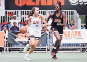  ?? Michael Reaves / Getty Images ?? Caroline Ducharme drives up the court during the SLAM Summer Classic 2019 girls game at Dyckman Park in New York City.