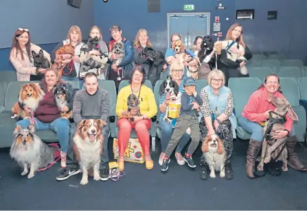  ??  ?? Some of the dogs and their owners get a taste of their upcoming day at Perth’s Playhouse.