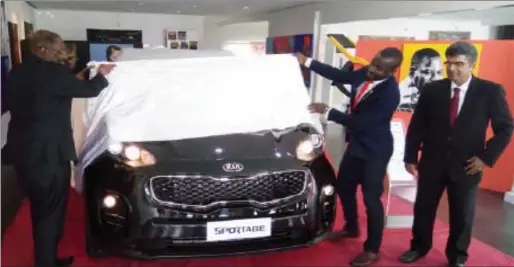  ??  ?? R-L: Corporate Sales Manager, Mr. Suresh Mordani; Marketing Manager, Olawale Jimoh; and Vice President, Kia Motors Nigeria, Mr. Olu Tikolo, at the unveiling of the all-new Kia Sportage in Lagos... recently