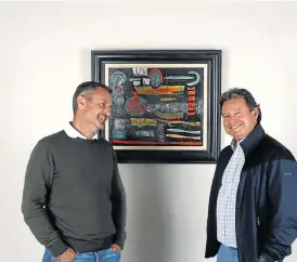  ?? /Supplied ?? Passionate collectors: Frank Kilbourn, left, and fellow abstract art collector Pieter Colyn with a work by Walter Battiss.