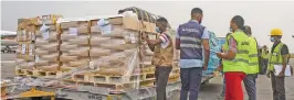  ?? (AFP) ?? A batch of the first doses of Oxford/AstraZenec­a vaccines from India arrives at the 4 de Fevereiro Internatio­nal Airport, in Luanda, the capital of Angola, on Tuesday