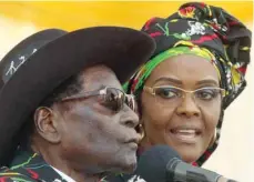  ?? — Reuters file photo ?? President Robert Mugabe and his wife Grace attend a rally of his ruling ZANU (PF) in Chinhoyi, Zimbabwe, on July 29, 2017.