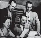  ?? ?? Warren Wefler, seated right, is shown in this 1954 photo from the Akron Beacon Journal. Wefler was part of a committee trying to install a sanitary sewer line near a cottage he owned in the Portage Lakes area.