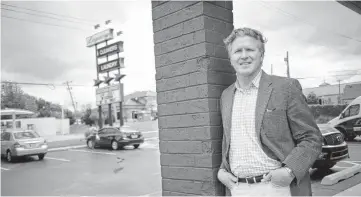  ?? [PHOTO BY DOUG HOKE, THE OKLAHOMAN] ?? Monte Turrentine, owner of Legacy Cleaners, 4917 N Western, stands Tuesday on property he plans to redevelop into upscale shops and housing.