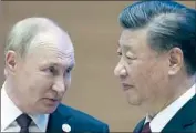  ?? Sergei Bobylev Kremlin Pool Photo ?? RUSSIAN President Vladimir Putin, left, with China’s Xi Jinping at the summit in Uzbekistan.