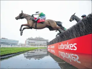  ?? Pic: Edward Whitaker ?? Cloth Clap on the way to winning the Ladbrokes Trophy in December