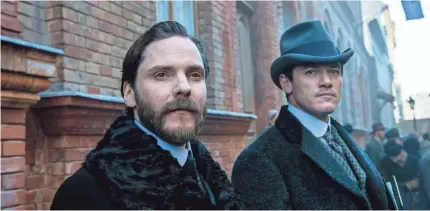  ??  ?? Dr. Laszlo Kreizler (Daniel Brühl, left) and his friend and former classmate John Moore (Luke Evans) follow the trail of a serial killer on the seedy streets of 1890s New York. PHOTOS BY KATA VERMES/TNT