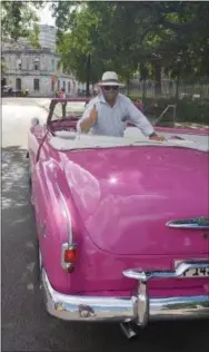  ?? PHOTOS BY BILL RETTEW — DIGITAL FIRST MEDIA ?? A Cuban cabbie and his 1951 Chevy convertibl­e.