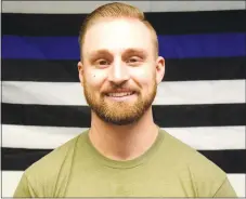  ?? Westside Eagle Observer/MIKE ECKELS ?? Luke Rouhselang joins the Decatur Police Department as a fulltime officer March 10. With the addition of Rouhselang, the department will be able to have two officers on duty day and night for the safety of the community and other officers.