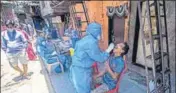  ?? PRATIK CHORGE/HT PHOTO ?? A doctor takes a swab sample of a Dharavi resident, in Mumbai, on Wednesday.