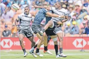  ?? Picture: MARTIN SERAS LIMA ?? Fiji 7s Josua Vakurunabi­li in action against Argentina during the Hamilton 7s
quarter finals yesterday.