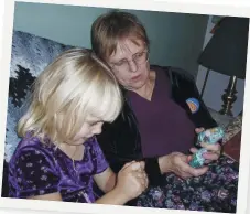  ??  ?? Elsie Rempel, author of Please Pass the Faith, sharing time with her granddaugh­ter Jo.