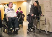 ?? CHRISTINNE MUSCHI ?? Activists wait in the hallway during a break at the courthouse this week as the Regroupeme­nt des activistes pour l’inclusion au Québec attempts to take the province, the AMT and STM to court in a class-action suit over lack of wheelchair access on...