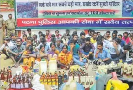  ?? HT FILE ?? Liquor bottles seized by police are on display at a press conference in Patna.