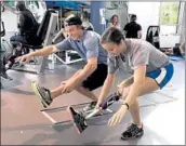  ?? Jessica Wise ?? DAVID WISE, the defending gold medalist in the ski halfpipe, works out with sister Christy in 2015.