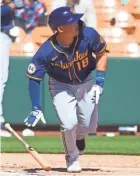  ?? MARK J. REBILAS / USA TODAY SPORTS ?? Brewers first baseman Keston Hiura hits a three-run home run Sunday in the 7-2 victory over the Chicago White Sox.