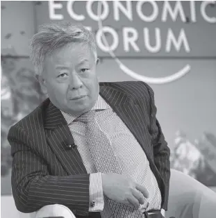  ?? WORLD ECONOMIC FORUM/MICHAEL WUERTENBER­G ?? JIN LIQUN at the annual meeting of the World Economic Forum in Davos, Switzerlan­d, January 25, 2013.
