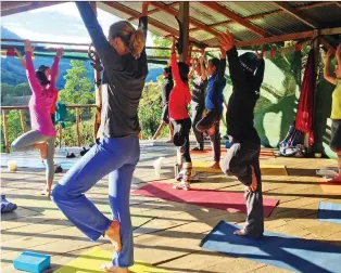  ?? PHOTOS: WILD WOMEN EXPEDITION­S ?? Wild Women Expedition­s’ journey to Costa Rica features morning yoga in a rustic lodge, but it’s not all laid-back.