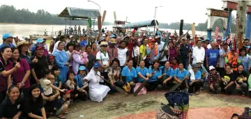  ??  ?? ‘Paddling with Christ’ participan­ts together with those travelling by land pose with Rev Father Obaso, Rev Father Olili and Rev Father Joseph before they set off to Selidap.