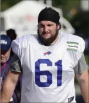  ?? ADRIAN KRAUS — THE ASSOCIATED PRESS ?? In this file photo, Buffalo Bills linebacker Jordan Mudge walks to the field during an NFL football training camp, in Pittsford, N. Y. Having never laid out a life plan outside of football, Jordan Mudge isn’t sure what he would be doing today had the...