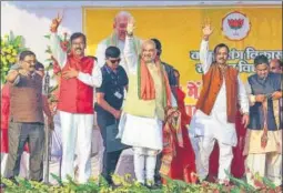  ?? PTI ?? BJP president Amit Shah (centre) during a rally in Chhattisga­rh’s Durg on Monday.