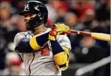  ?? Nick Wass / Associated Press ?? The Braves’ Ronald Acuna Jr. was taking swings at the team’s spring training camp on Wednesday, getting an early start.