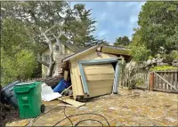  ?? DAVID MULLALLY — HERALD CORRESPOND­ENT ?? A fallen tree crushed a garage at Santa Fe and Mountain View in Carmel Tuesday.