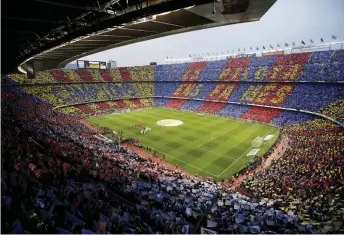  ?? — AFP photo ?? A general view shows the Spanish league football match between FC Barcelona and Real Madrid CF at the Camp Nou stadium in Barcelona in this May 6, 2018 file photo.