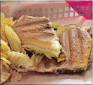  ??  ?? EILEEN JENKINS Café Sol’s Cuban sandwich