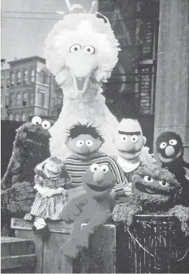  ?? RICHARD TERMINE/ CTW ?? From left, Cookie Monster, Prairie Dawn, Big Bird, Ernie, Elmo, Bert, Oscar the Grouch and Grover, pose for a photo in 1999.