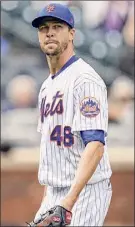  ?? John Minchillo / Associated Press ?? Mets starting pitcher Jacob degrom allowed one run, five hits and no walks, while striking out 14 batters Saturday vs. the Marlins.