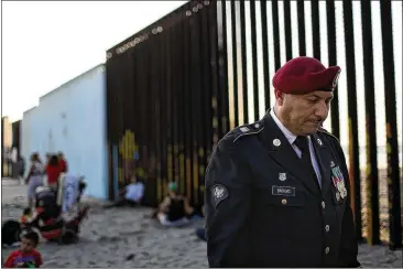  ?? JUSTIN SULLIVAN / GETTY IMAGES ?? Deported U.S. Army veteran Hector Barajas (foreground) founded the Deported Veterans Support House, also known as “The Bunker,” to support deported veterans by offering food, shelter, clothing as well as advocating for political legislatio­n that would...