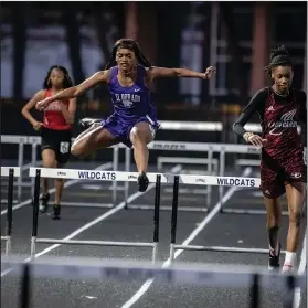  ?? Southern Sass/Special to News-Times ?? Clearing hurdles: El Dorado's Addrienna Gray competes in the 100 hurdles during the Oil Belt Relays last Thursday at Memorial Stadium. Gray won both the 100 hurdles and 300 hurdles at the meet.