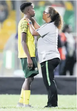  ?? Picture: Backpagepi­x ?? SYMPATHETI­C. Banyana coach Desiree Ellis (right) consoles Lebohang Ramalepe after her side lost to Nigeria on Saturday.