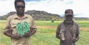  ??  ?? Benson (Isaiah) Nagurrgurr­ba (left) and Graham Badari with their designs. Right, a third design